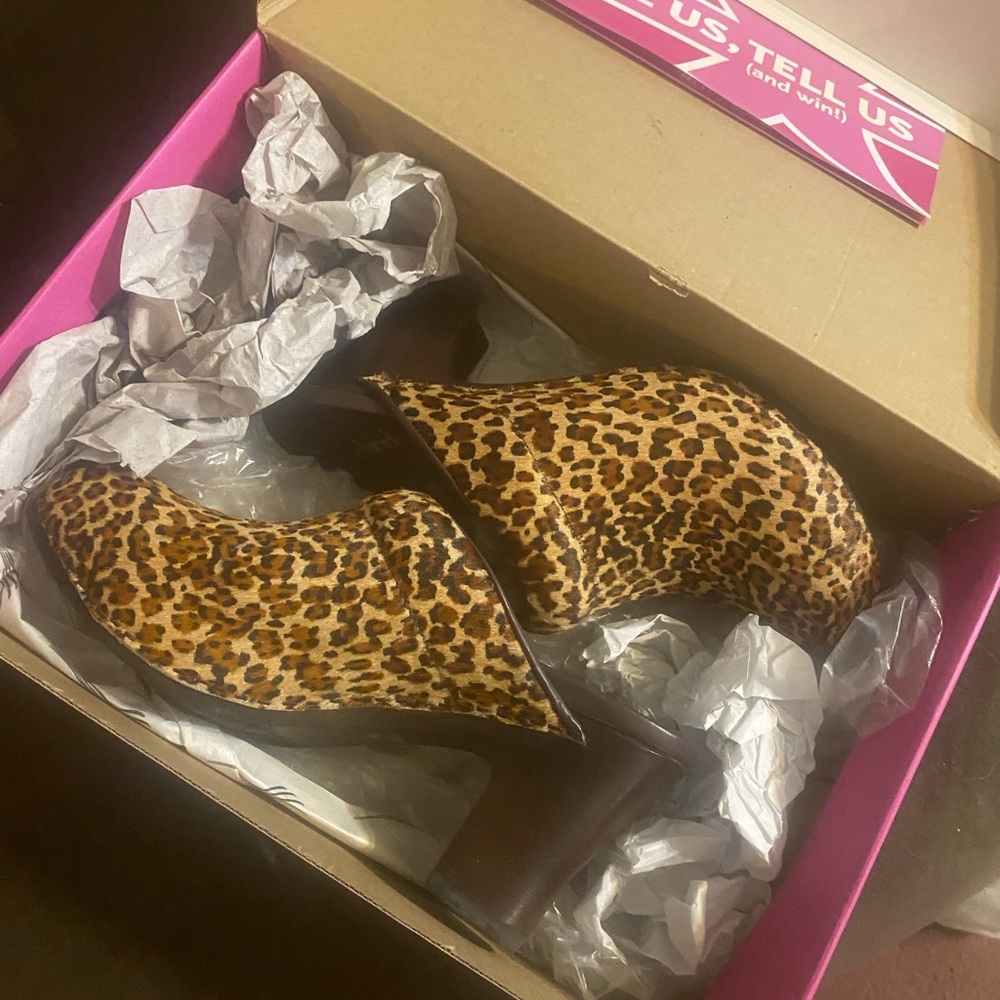 Dansko leopard print shoes brand new never worn still in box